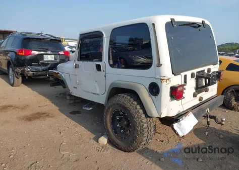 1999 Jeep Wrangler Sport z USA, uszkodzony, nr VIN 1J4FY19S2XP493947